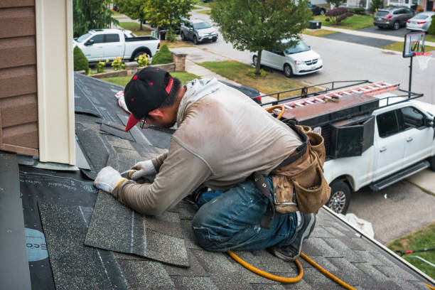Professional Roofing technician working in Harrison, ID